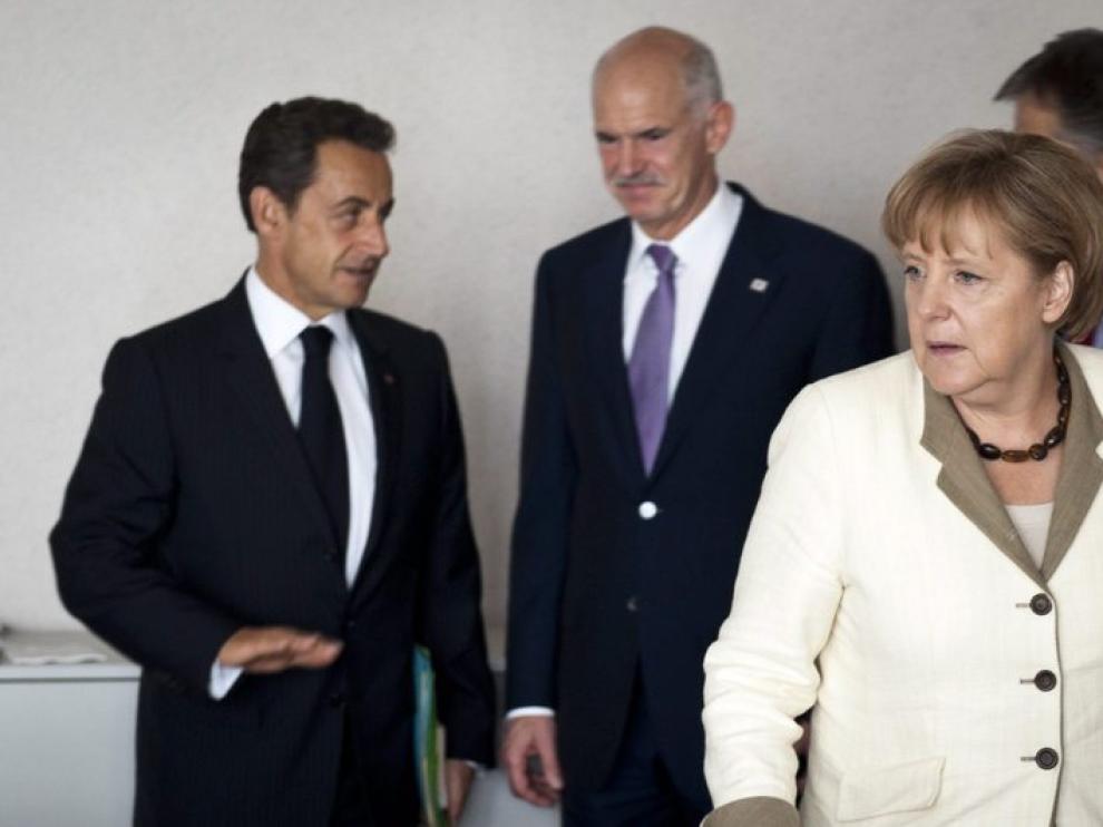 Merkel y Sarkozy durante la cumbre de Bruselas.