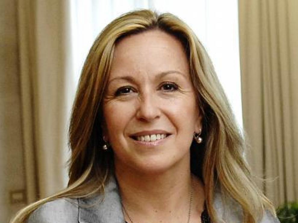 La ministra dice que su sonrisa es fruto de su optimismo.