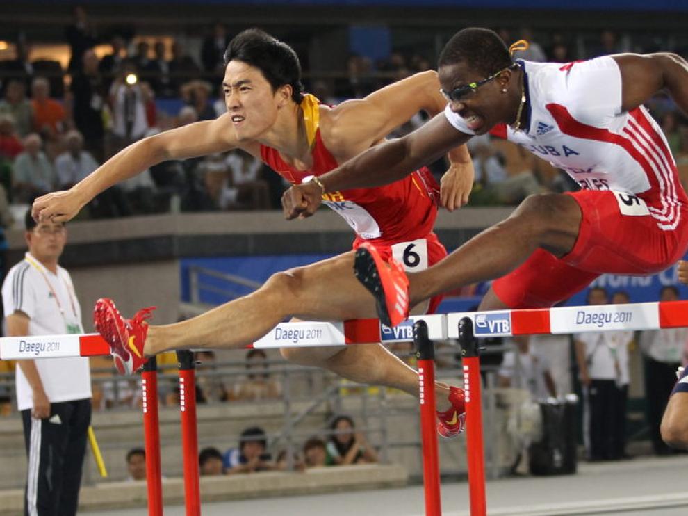 Liu Xiang y Dayron Robles, durante la prueba