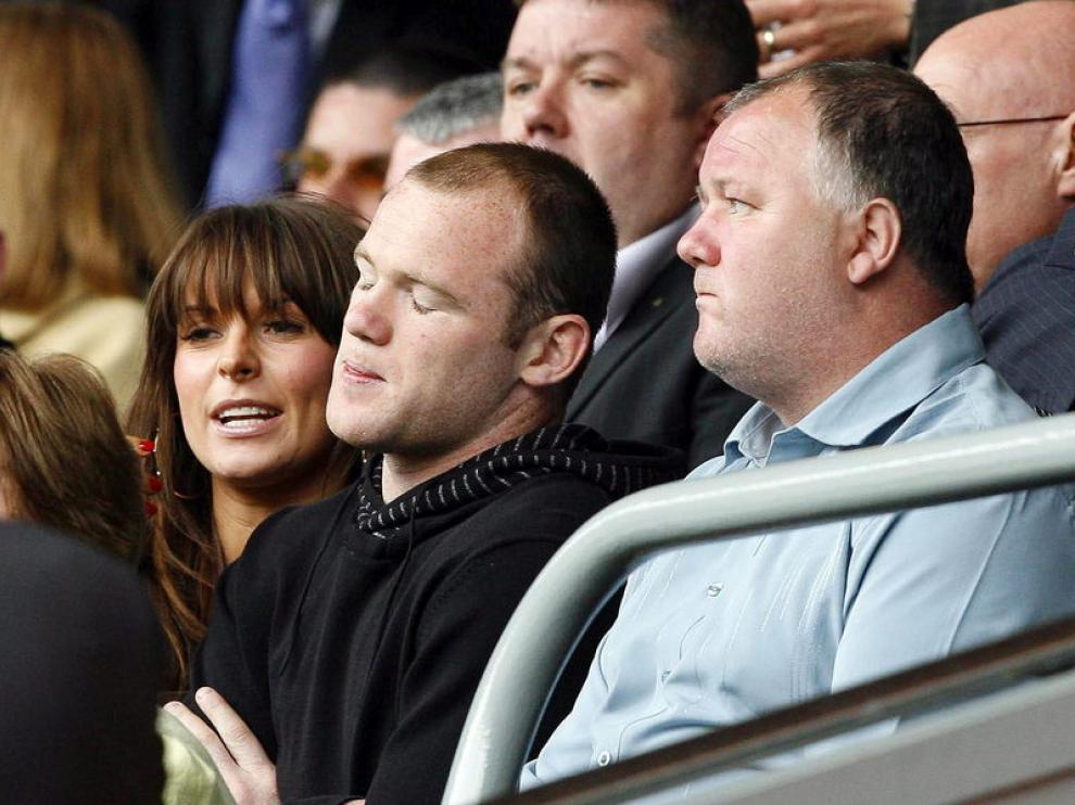 Wayne Rooney junto a su padre