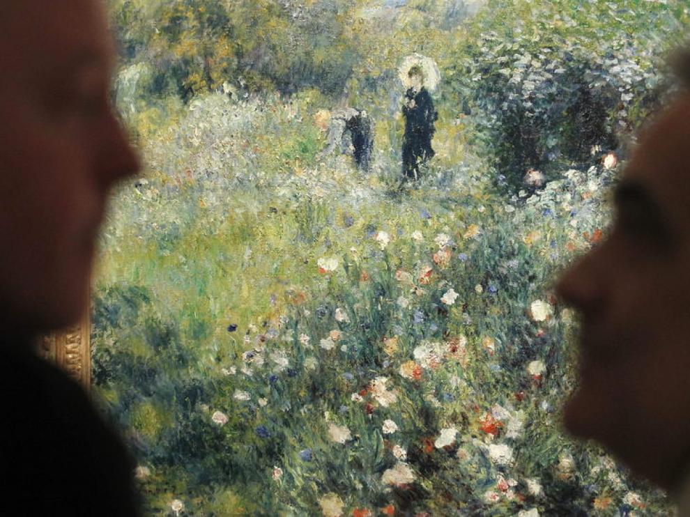 'Mujer con sombrilla en un jardín', de Renoir
