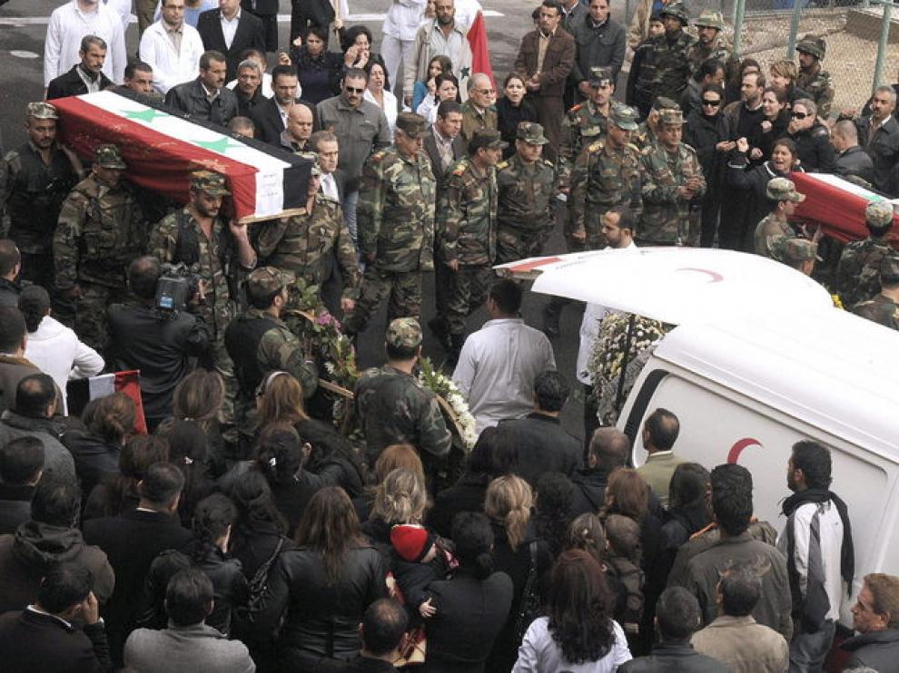 Funeral de policías en Damasco