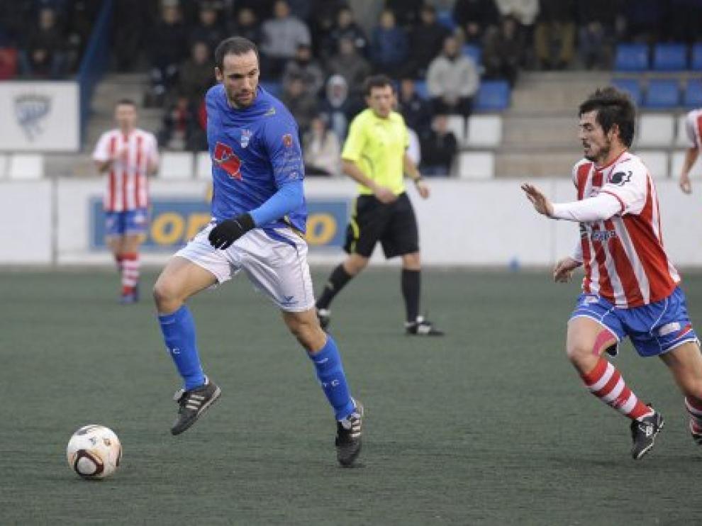 Imagen del encuentro entre el Utebo y el Barbastro