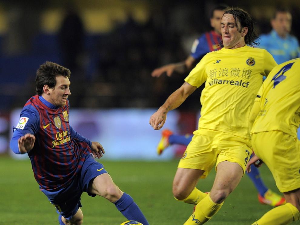 Messi y Rodríguez en una jugada del partido