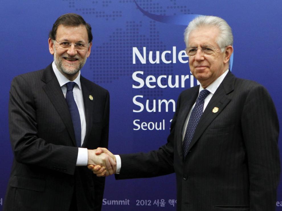 Rajoy y Mario Monti en Seúl