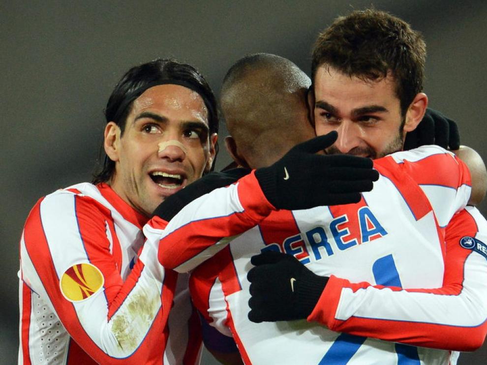 Jugadores del Atlético de Madrid celebran la victoria