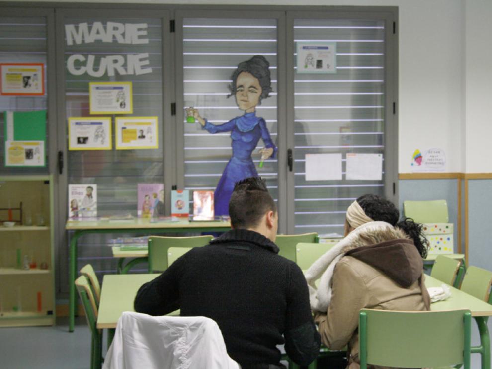 Padres en el Marie Curie, rellenando una solicitud
