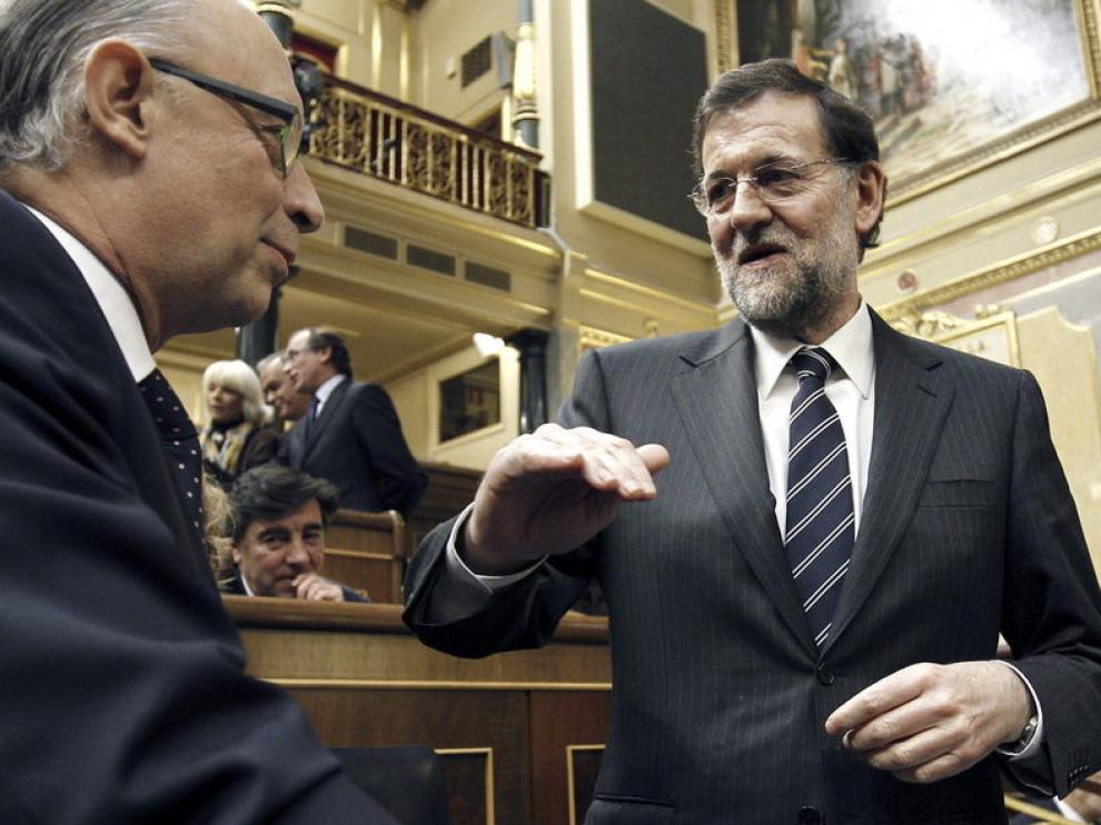 Rajoy y Montoro, durante la sesión en el Congreso