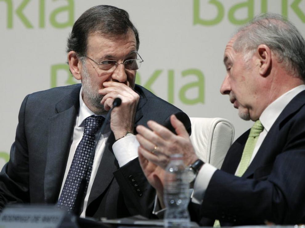 Rajoy y Rato en un encuentro en marzo
