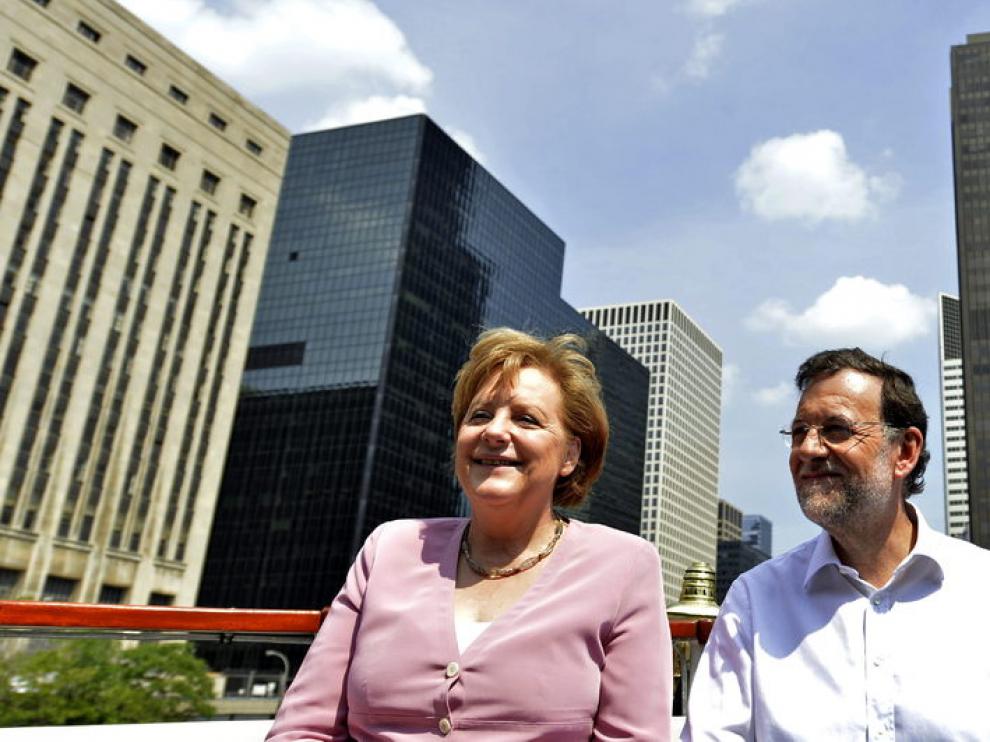 Merkel y Rajoy, durante su entrevista en Chicago