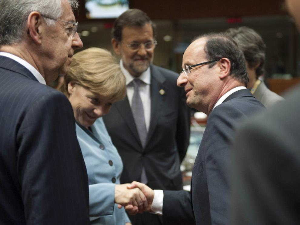 Merkel y Hollande durante el encuentro de líderes de la UE.