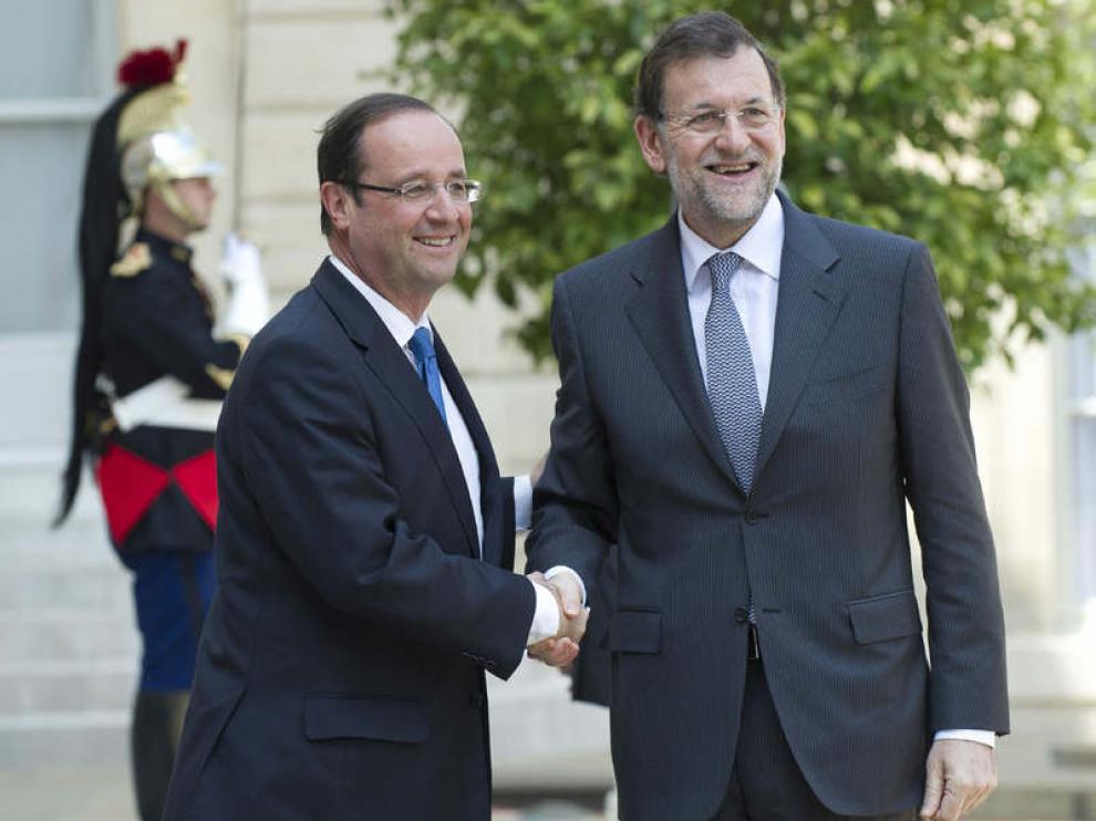 François Hollande Saluda a Mariano Rajoy