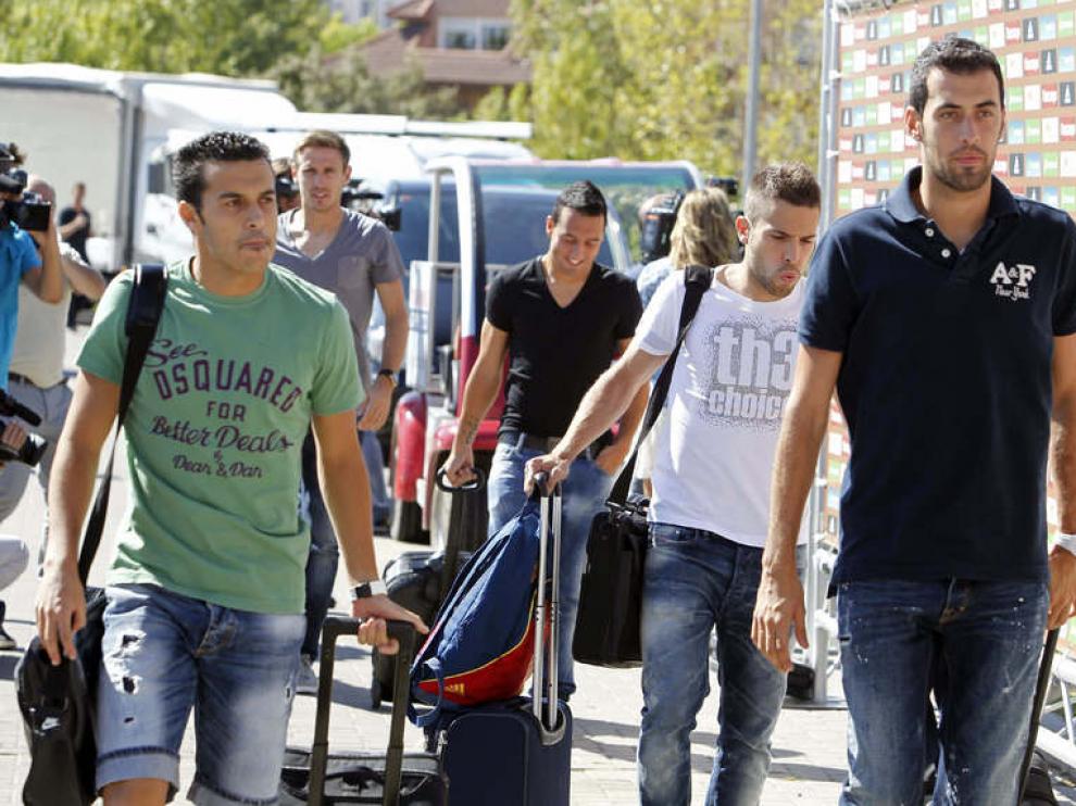 Pedro y Busquets, en primer término, en su llegada a Las Rozas