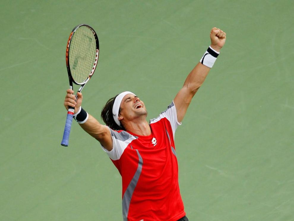 Ferrer celebra su victoria ante Tipsarevic