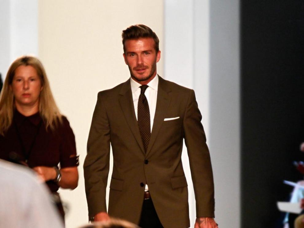 Beckham asiste a la presentación de Victoria.