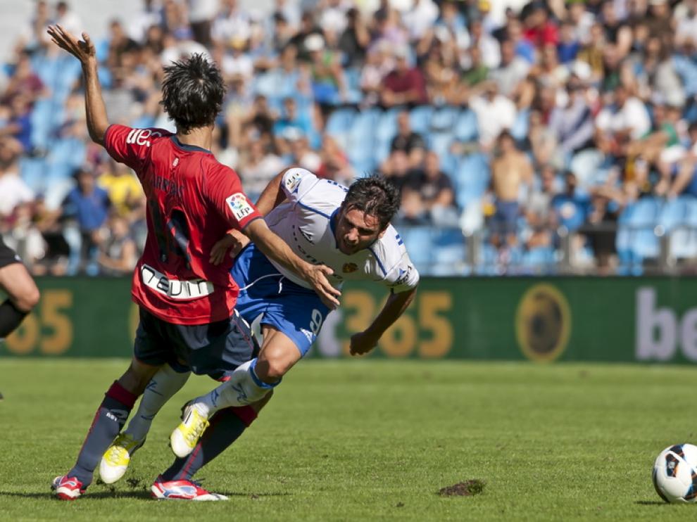 Arribas derriba a Postiga en el choque de la primera vuelta