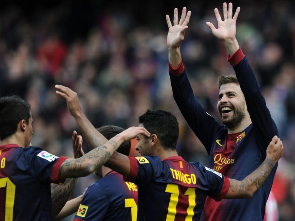 Piqué celebra un gol