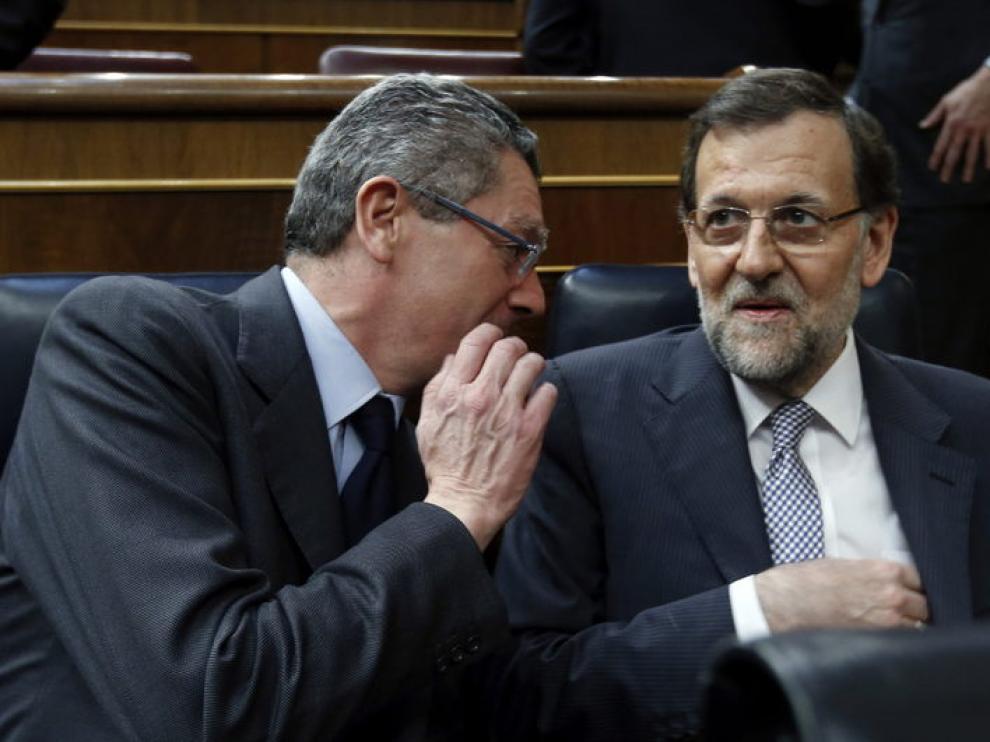 Gallardón y Rajoy durante el debate sobe el estado de la Nación.