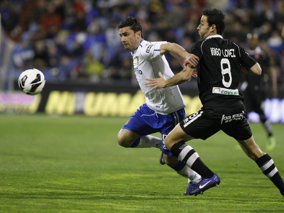 Imágenes de la grada y del partido del Real Zaragoza y el Granada en La Romareda