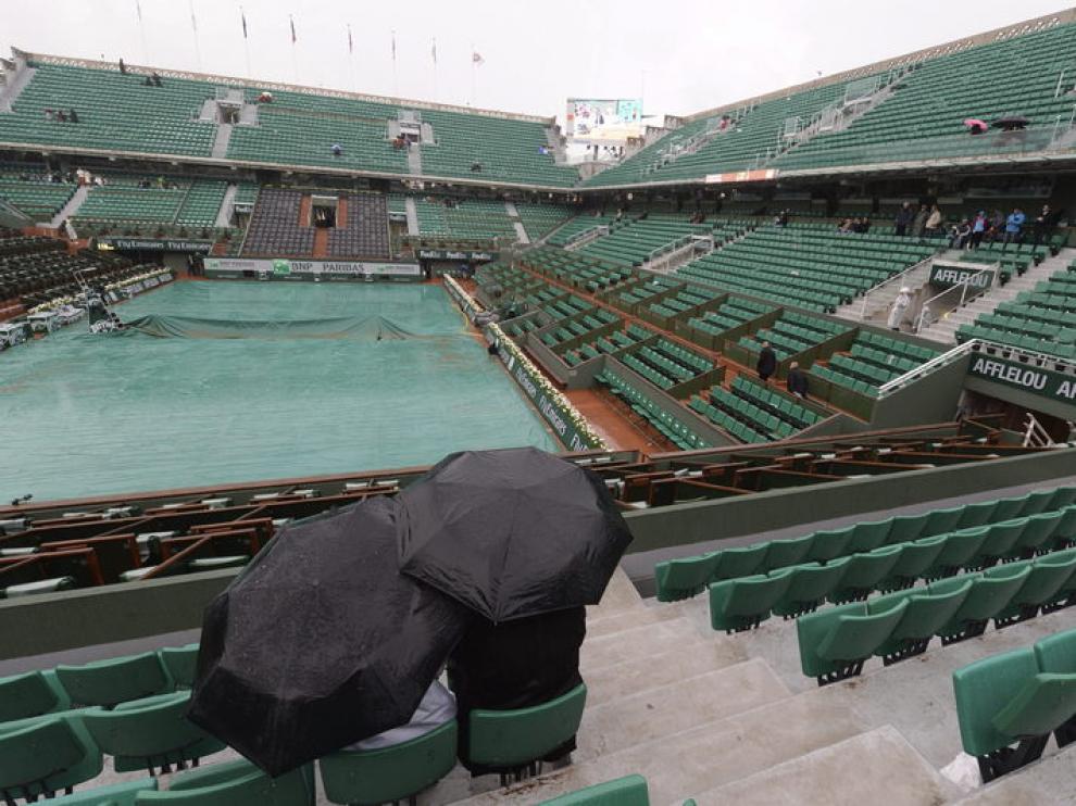 La luvia agua la jornada en Roland Garros
