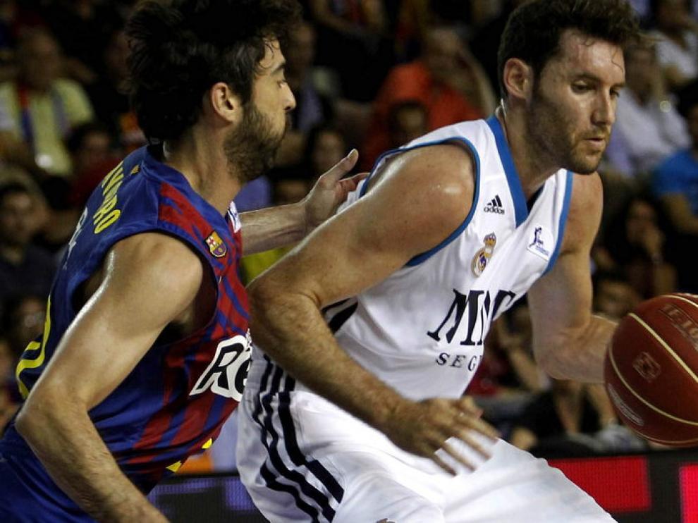 Rudy Fernández en una jugada con Navarro