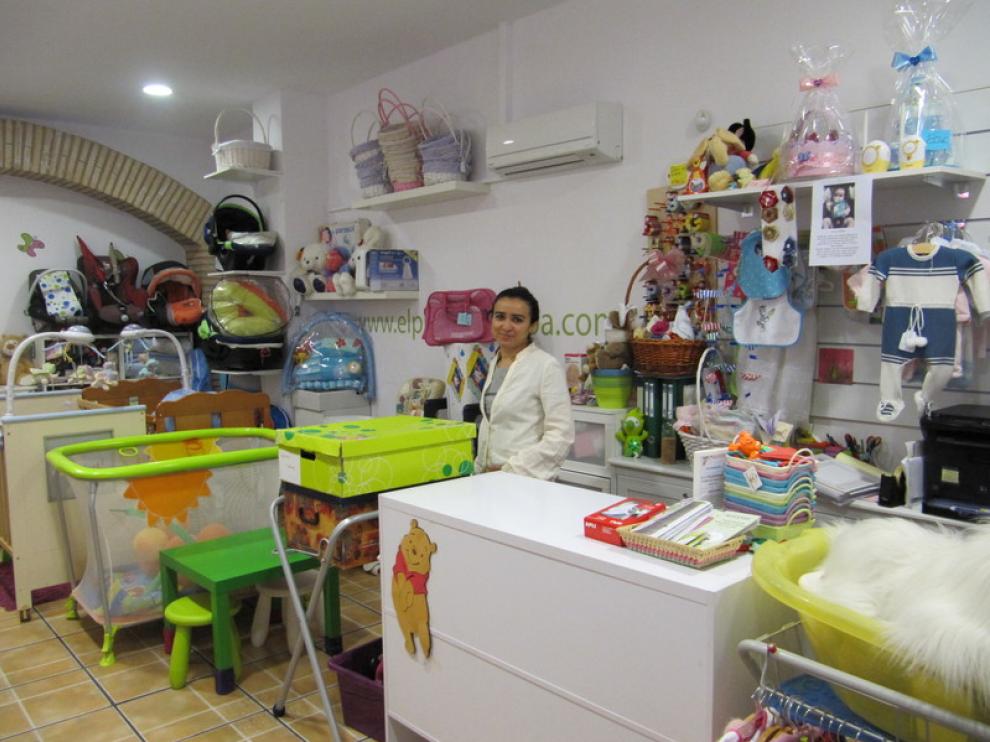 Tienda de segunda mano para bebés en el Arrabal