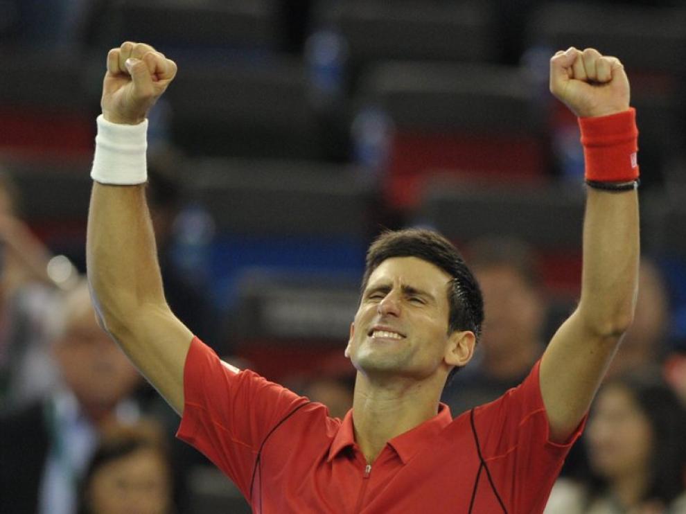 Djokovic celebra su victoria ante Tsonga