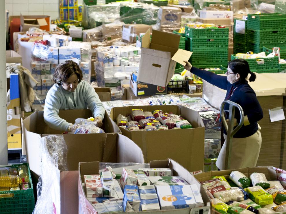 Labores de recogida y entrega de los alimentos por parte de los voluntarios