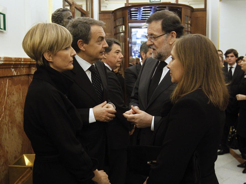 Zapatero y Rajoy, junto a sus respectivas esposas