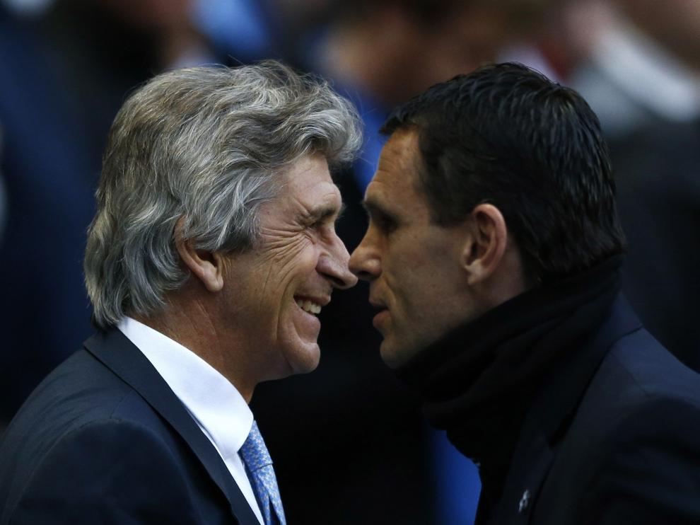Poyet y Pellegrini, en el partido