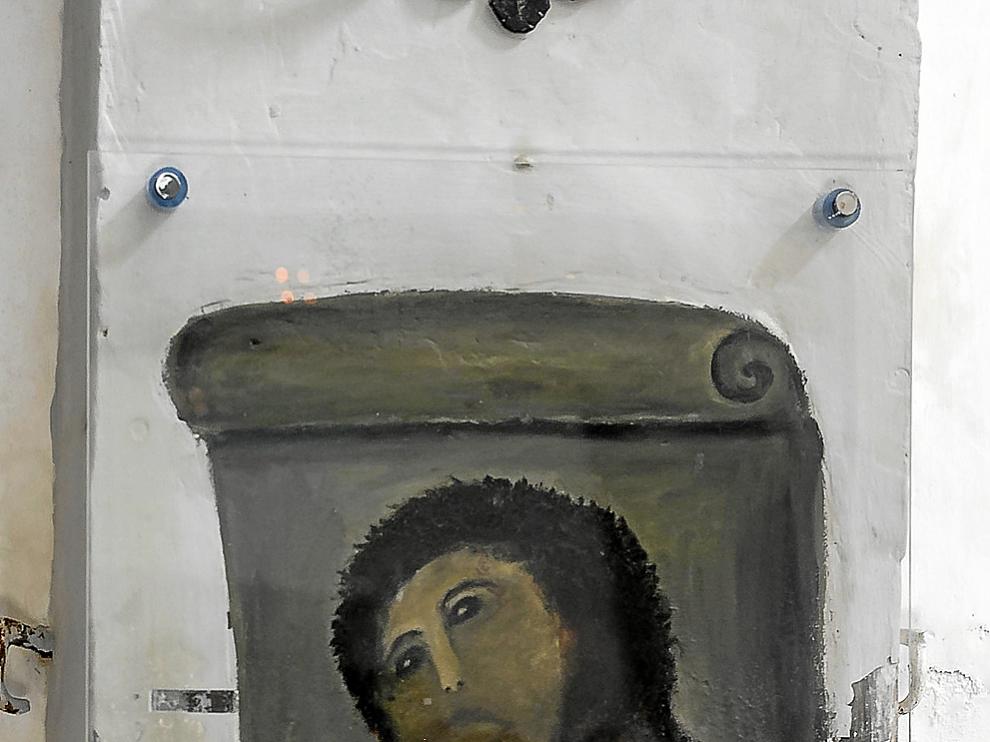 La pintura del eccehomo, tal cual quedó después de la restauración fallida.