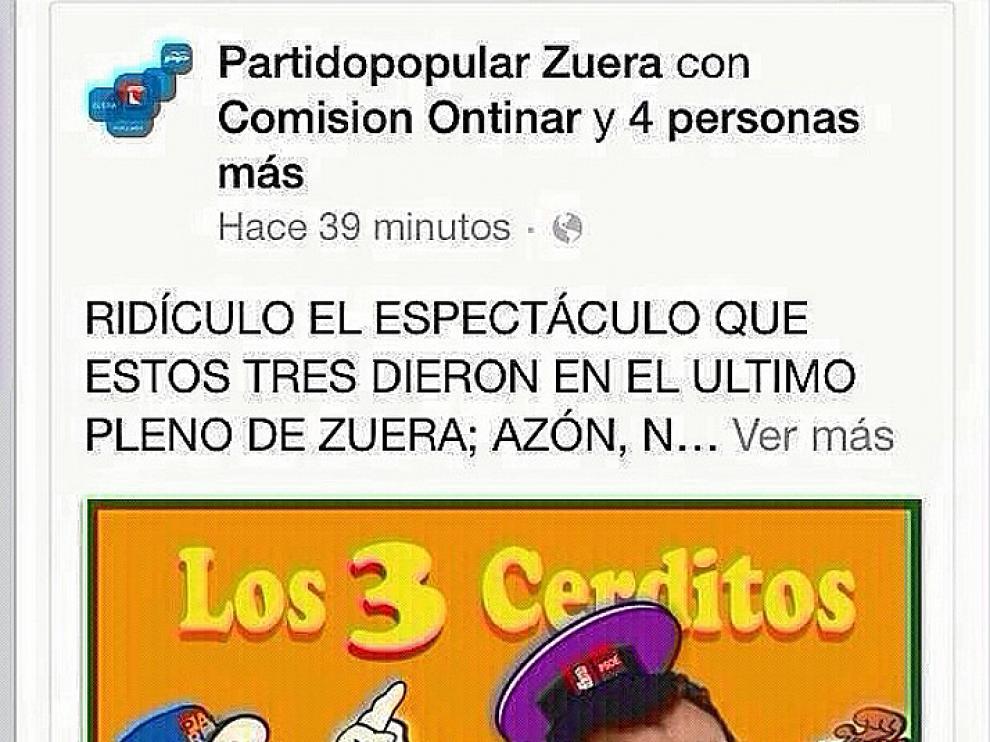 Los populares de Zuera utilizaron una imagen del popular cuento de Los Tres Cerditos para caricaturizar al portavoz del PAR, Francisco Nasarre, que aparece de azul como el cerdito Práctico.