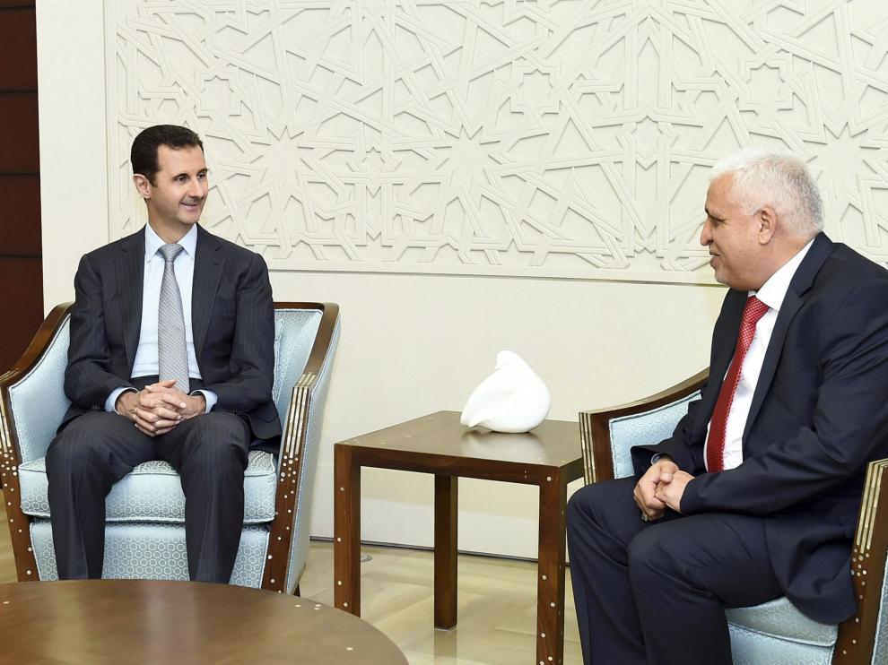 Al Asad junto al Consejero de Seguridad iraquí