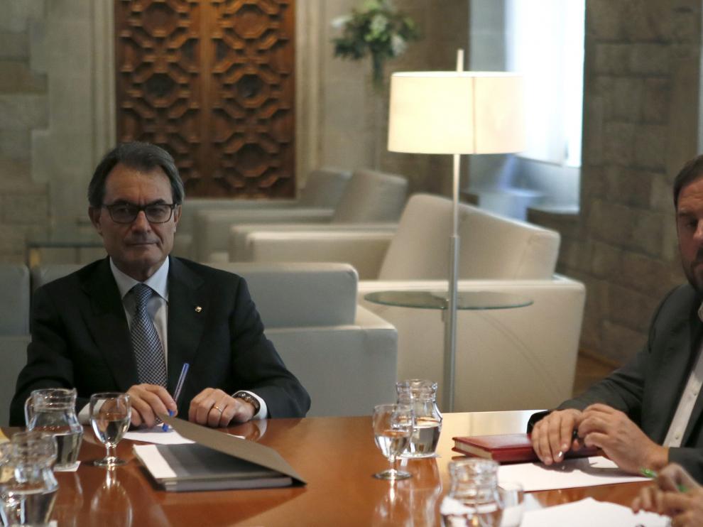Artur Mas, presidente de la Generalitat y el lider de ERC, Oriol Junqueras