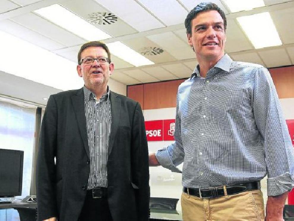 Pedro Sánchez, en julio junto al secretario general del PSOE valenciano, Ximo Puig.