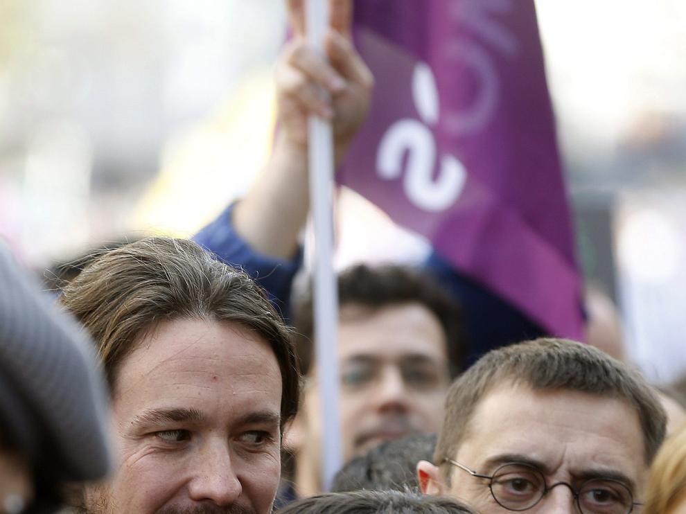 El líder de Podemos, Pablo Iglesias, y el número tres, Juan Carlos Monedero, durante la "marcha del cambio",