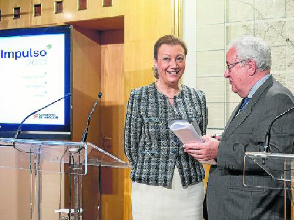 La presidenta de Aragón, Luisa Fernanda Rudi, y el líder del PAR, José Ángel Biel, en la presentación del plan.