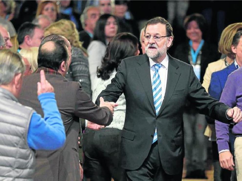 Rajoy, a su llegada al Palacio de Congresos de Madrid, donde ayer se clausuró la convención.
