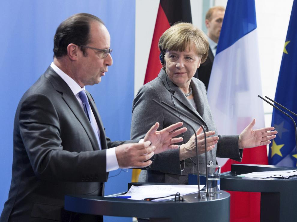 Hollande y Merkel en la rueda de prensa de este martes en la cancillería alemana