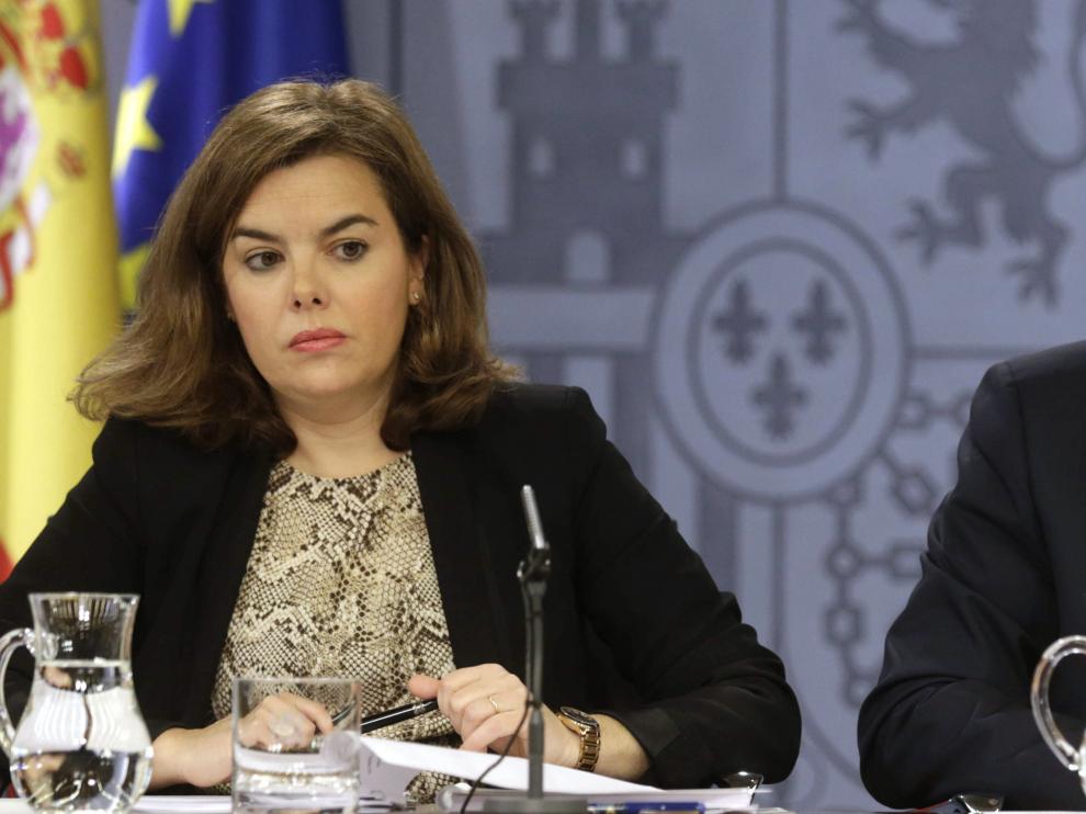 Soraya Saénz de Santamaría y Cristóbal Montoro tras el Consejo de Ministros