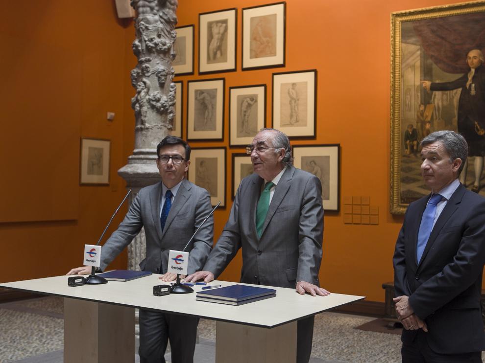 Román Escolano, Amado Franco y Víctor Iglesias, en la firma del acuerdo