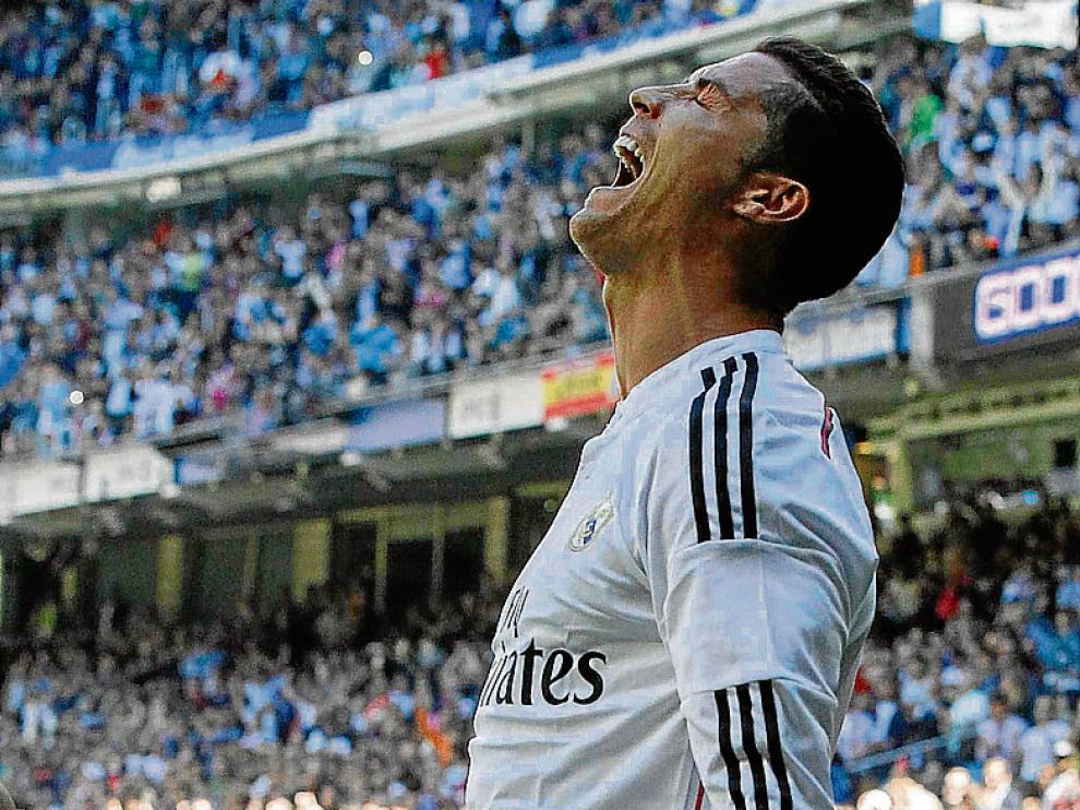 Cristiano celebra su quinto gol ante el Granada.