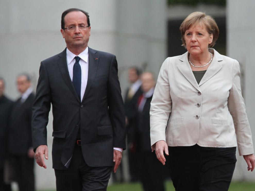 Merkel y Hollande reclaman más fondos y más compromisos ante el cambio climático