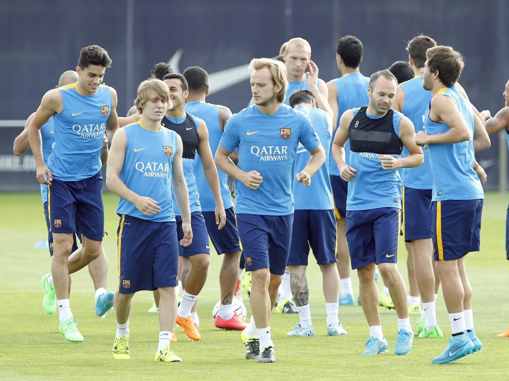 Los jugadores del Barcelona, durante un entrenamiento