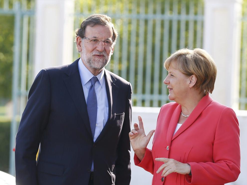 El presidente del Gobierno español, Mariano Rajoy y la canciller alemana, Angela Merkel.