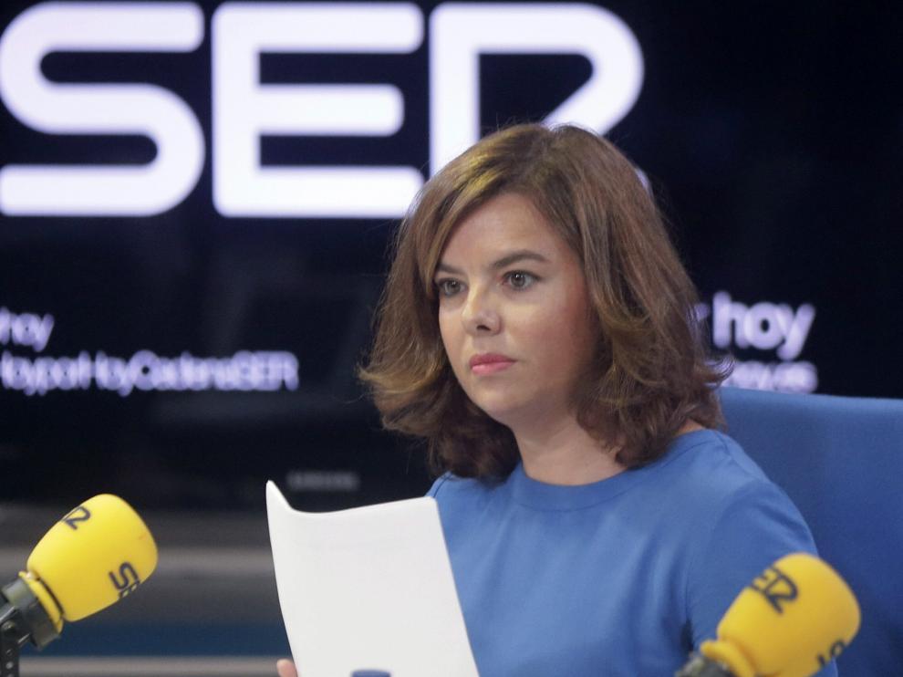 La vicepresidenta del Gobierno, Soraya Saenz de Santamaría, durante la entrevista en el prograna 'Hoy por hoy' de la Cadena SER.