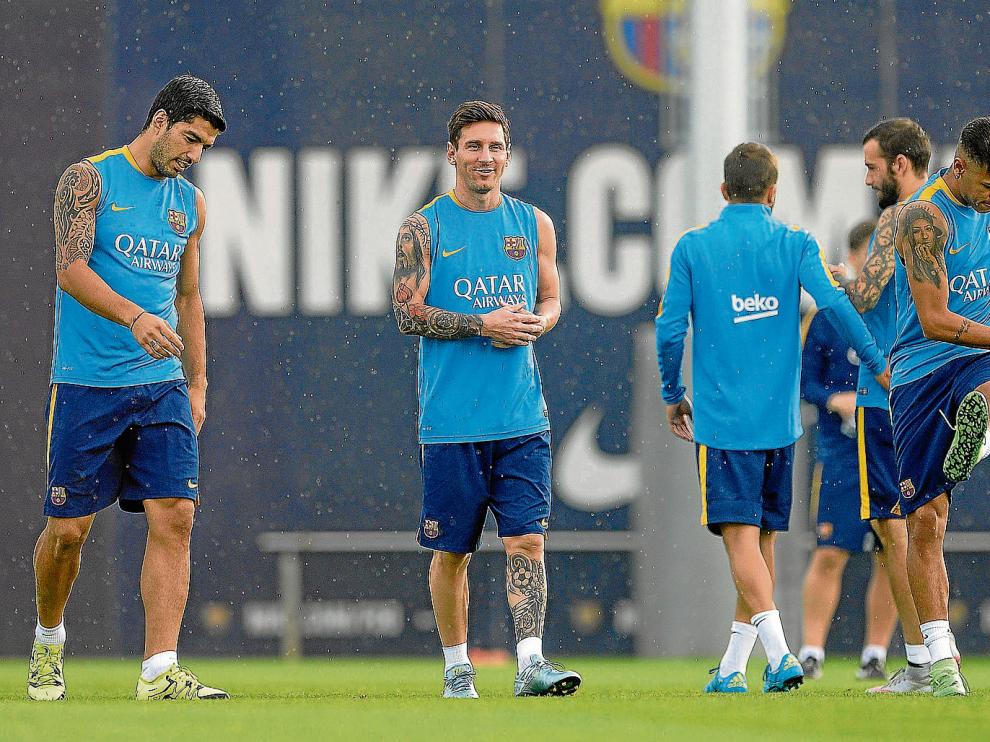 Luis Suárez, Leo Messi y Neymar que no ha viajado a Bilbao, en el entrenamiento de ayer.
