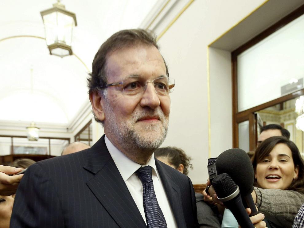 El jefe del Ejecutivo, Mariano Rajoy, a su llegada esta mañana al Congreso de los Diputados para asistir a la última sesión de control al Gobierno con la que la Cámara Baja pone fin hoy a la X legislatura