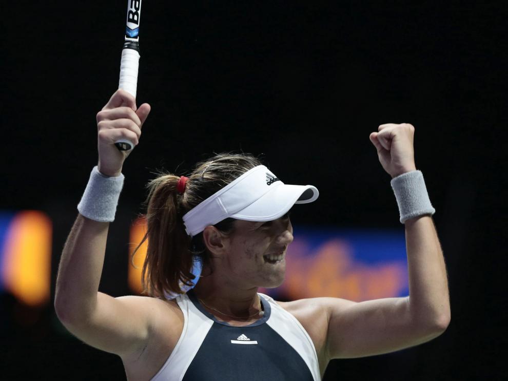 La tenista española Garbiñe Muguruza celebra su triunfo contra la checa Lucie Safarova.