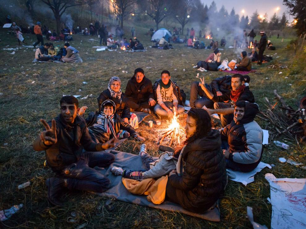 Un grupo de refugiados en la frontera entre Austria y Eslovenia.